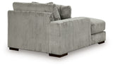 Ashley Furniture Lindyn sectional with chaise, featuring a modern fabric design and plush seating for comfortable lounging.