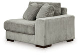 Ashley Furniture Lindyn sectional with chaise, showing a modern fabric sofa in a stylish living room setting.