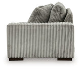 Ashley Furniture Lindyn sectional with chaise, featuring plush upholstery and modern design, shown from the side view.