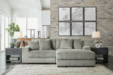 Ashley Furniture Lindyn sectional with chaise, showcasing plush fabric upholstery and modern design in a spacious living room setting.