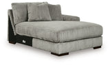 Ashley Furniture Lindyn sectional with chaise, showing a modern fabric sofa with plush cushions and a spacious chaise lounge.