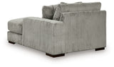 Ashley Furniture Lindyn sectional with chaise, showing plush fabric upholstery and spacious seating in a modern living room setting.