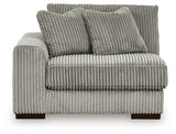 Ashley Furniture Lindyn sectional with chaise, showing plush fabric upholstery and modern design from a front head-on view.