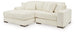 Ashley Furniture Lindyn sectional with chaise in neutral fabric, showcasing modern design and comfortable seating arrangement.