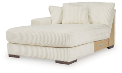 Ashley Furniture Lindyn sectional with chaise, showing a modern sectional sofa with plush cushions in a stylish living room setting.