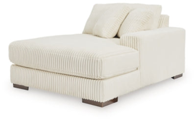 Ashley Furniture Lindyn sectional with chaise, shown from an angled view, featuring plush upholstery and modern design.