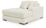 Ashley Furniture Lindyn sectional with chaise, shown from an angled view, featuring plush upholstery and modern design.