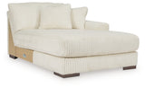 Ashley Furniture Lindyn sectional with chaise, showing a modern fabric sofa with a chaise lounge in a well-lit living room.
