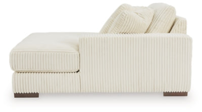 Ashley Furniture Lindyn sectional with chaise, showing plush fabric upholstery and modern design in a spacious living room setting