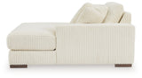 Ashley Furniture Lindyn sectional with chaise, showing plush fabric upholstery and modern design in a spacious living room setting