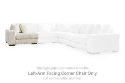 Ashley Furniture Lindyn sectional with chaise, modern fabric sofa with plush cushions and extended chaise lounge.
