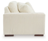 Ashley Furniture Lindyn sectional with chaise, showing plush fabric upholstery and modern design in a living room setting.