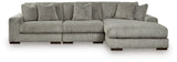 Ashley Furniture Lindyn sectional with chaise, featuring plush fabric, modern design, and multiple seating areas.