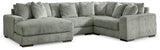 Ashley Furniture Lindyn sectional with chaise, showcasing plush fabric upholstery and modern design in a spacious living room setting.