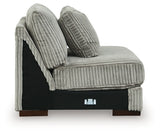 Ashley Furniture Lindyn sectional with chaise, featuring plush upholstery and modern design, shown from a side view.