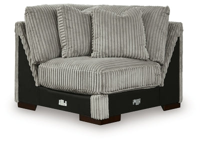 Ashley Furniture Lindyn sectional with chaise, featuring plush upholstery and contemporary design, shown in a head-on view.