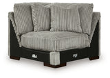 Ashley Furniture Lindyn sectional with chaise, featuring plush upholstery and contemporary design, shown in a head-on view.