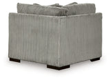 Ashley Furniture Lindyn sectional with chaise, showing plush fabric upholstery and overstuffed back cushions.