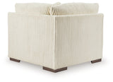 Ashley Furniture Lindyn sectional with chaise, showing the back view of the modern fabric sectional sofa.