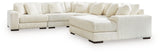 Ashley Furniture Lindyn sectional with chaise, showcasing plush fabric upholstery and modern design in a living room setting.