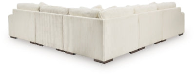 Ashley Furniture Lindyn sectional with chaise, showing plush upholstery and modern design from the back view.