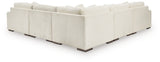 Ashley Furniture Lindyn sectional with chaise, showing plush upholstery and modern design from the back view.
