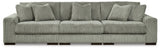 Ashley Furniture Lindyn sectional sofa with plush cushions and neutral fabric, shown in a spacious living room setting.