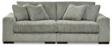 Ashley Furniture Lindyn sectional sofa with plush cushions and modern design, shown in a spacious living room setting.