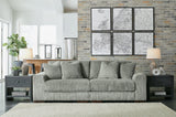 Ashley Furniture Lindyn sectional sofa with plush cushions and modern design, shown in a stylish living room setting.