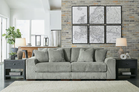 Ashley Furniture Lindyn sectional sofa with plush cushions and modern design, shown in a stylish living room setting.