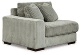 Ashley Furniture Lindyn sectional sofa with plush cushions and modern design, shown in a living room setting.