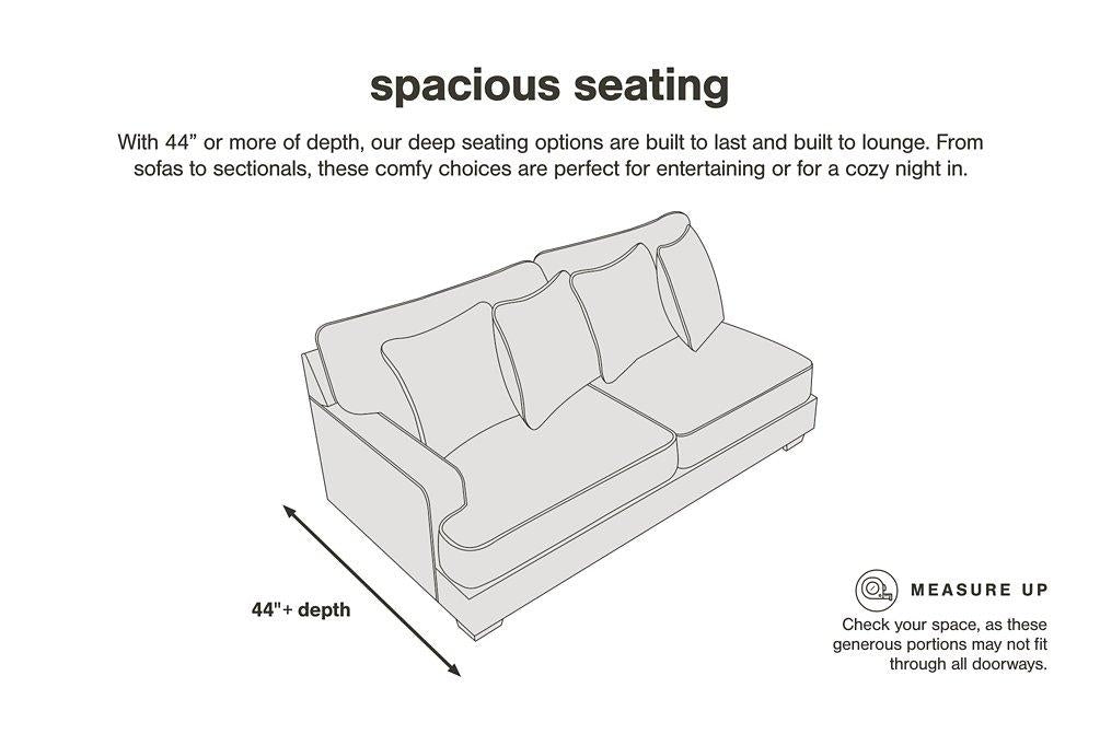 Ashley Furniture Lindyn sectional sofa with plush cushions and modern design, shown in a spacious living room setting.