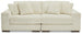 Ashley Furniture Lindyn sectional sofa with plush cushions and neutral fabric, showcasing a modern L-shaped design in a living room setting.