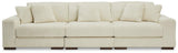Ashley Furniture Lindyn sectional sofa with plush fabric and modern design, featuring multiple seating sections and cozy cushions.