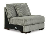 Ashley Furniture Lindyn sectional sofa with plush cushions and modern design, shown in a spacious living room setting.