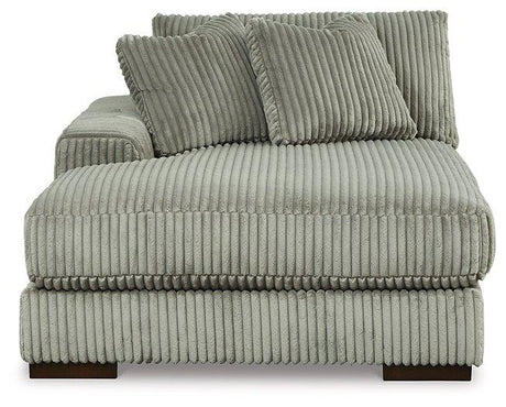 Ashley Furniture Lindyn sectional with double chaise, featuring plush fabric, modern design, and spacious seating arrangement.