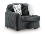 Ashley Furniture Midnight-Madness sectional sofa shown from an angled view, featuring plush cushions and modern design.