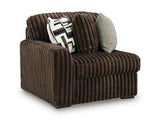 Ashley Furniture Midnight-Madness sectional sofa shown from an angled view, featuring plush cushions and modern design.