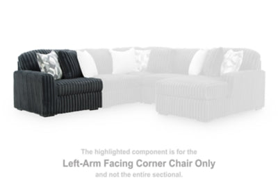 Ashley Furniture Midnight-Madness sectional sofa with plush cushions and modern design, shown in a stylish living room setting.
