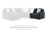 Ashley Furniture Midnight-Madness sectional sofa with plush cushions and modern design, shown in a spacious living room setting.