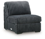 Ashley Furniture Midnight-Madness sectional sofa shown from an angled view, featuring plush cushions and modern design.
