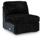 Ashley Furniture Midnight-Madness sectional sofa shown from an angled view, featuring plush cushions and modern design.