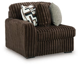 Ashley Furniture Midnight-Madness sectional sofa in dark upholstery, shown from an angled side view.