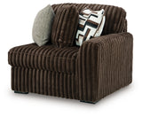 Ashley Furniture Midnight-Madness sectional sofa in a modern L-shape with plush cushions, viewed from an angled perspective.