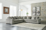 Ashley Furniture Lindyn sectional sofa with plush cushions and neutral fabric, shown in a modern living room setting.