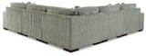 Ashley Furniture Lindyn sectional sofa with plush cushions and modern design, shown in a cozy living room setting.