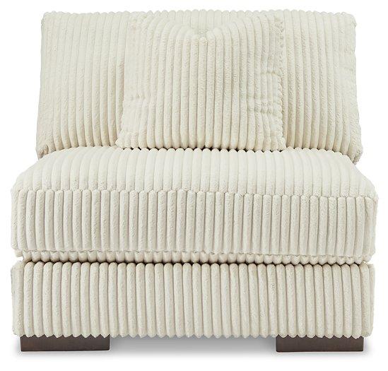 Ashley Furniture Lindyn sectional sofa with plush cushions and modern design, shown in a cozy living room setting.