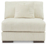 Ashley Furniture Lindyn sectional sofa with plush cushions and modern design, shown in a cozy living room setting.