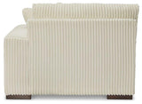 Ashley Furniture Lindyn sectional sofa with plush cushions and modern design, shown in a spacious living room setting.