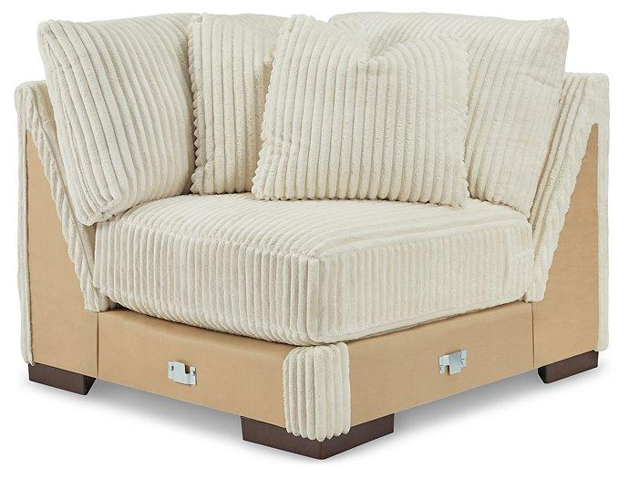 Ashley Furniture Lindyn Sectional sofa with plush cushions and modern design, shown in a cozy living room setting.
